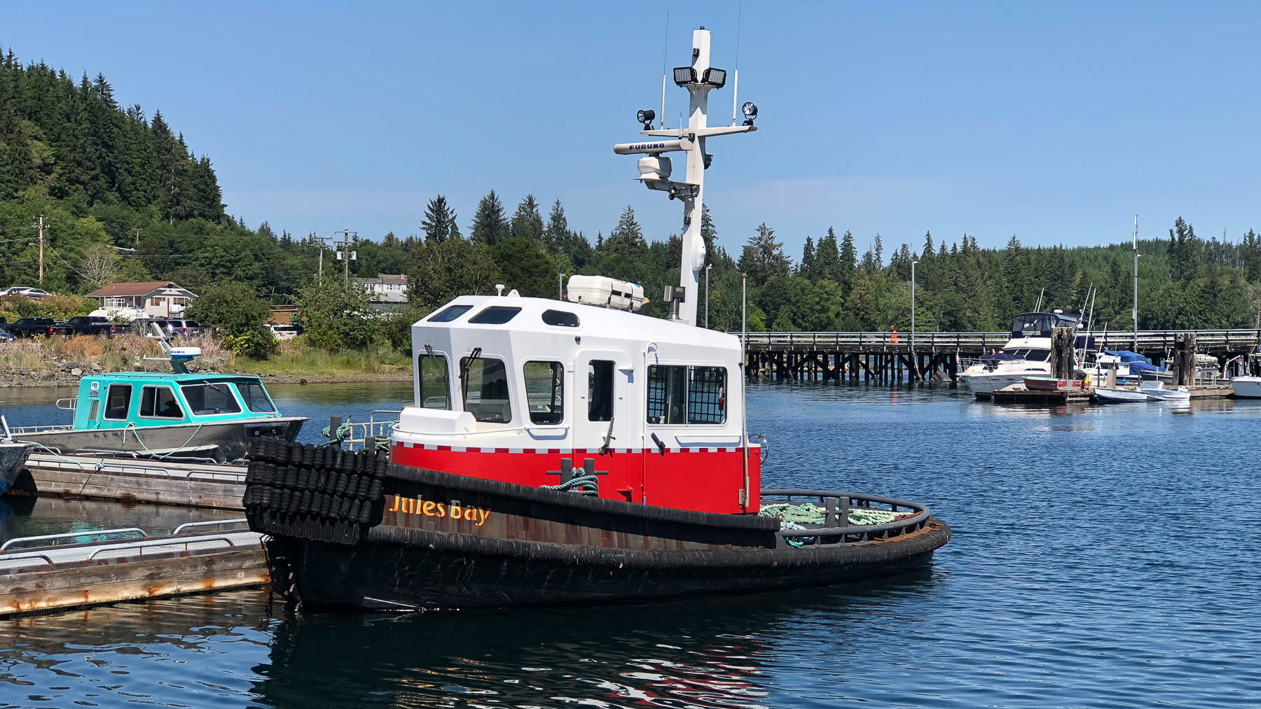 The tug Jules Bay tied up at a coastal dock